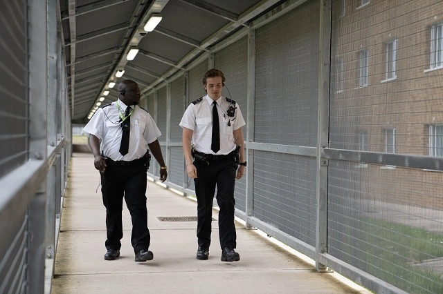 HMPPS worker speaks to a colleague